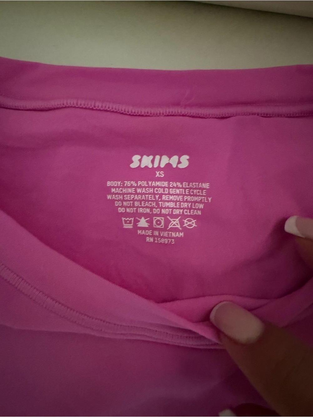 SKIMS Kids Long-Sleeve One-Piece Bodysuit in Hot Pink - Picture 3 of 4